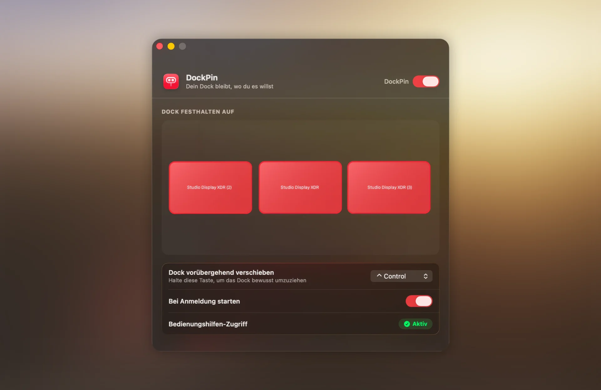 Screenshot des DockPin-Fensters: die Auswahl des Bildschirms mit drei Studio Displays, darunter die Optionen für Modifier-Taste, Autostart und Bedienungshilfen-Zugriff.